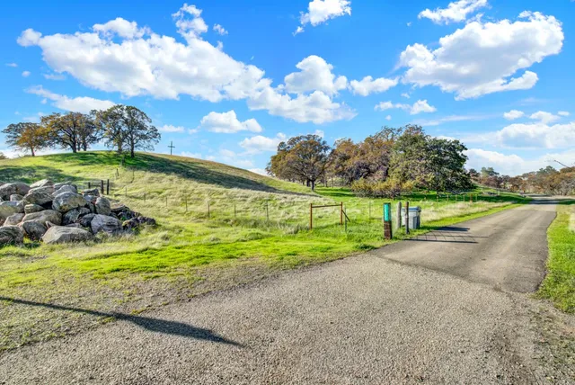 a view of a lake with a yard