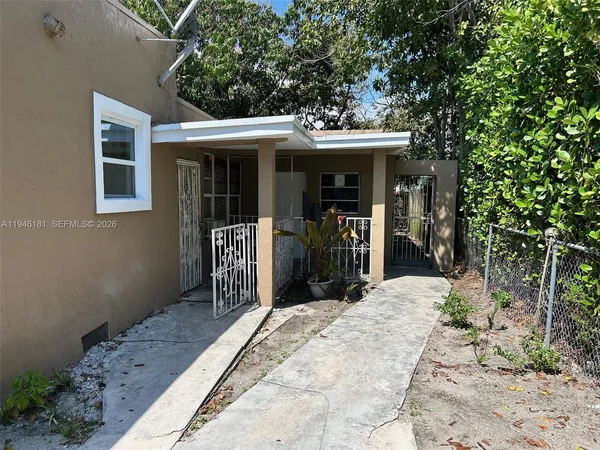 a front view of a house with a porch