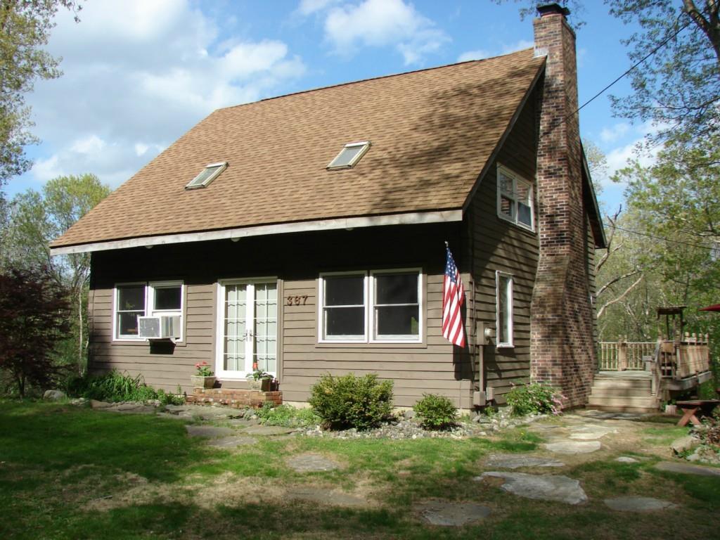 367 Barrett Hill Road Brooklyn, CT 06234 - Photo 1 of 1 a front view of a house with a yard