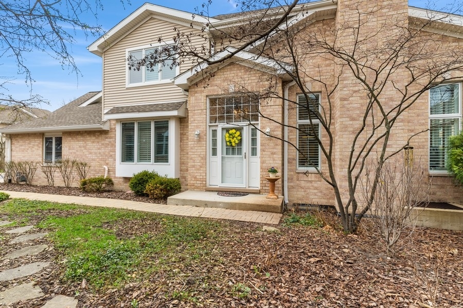 1722 Park Ridge Point Park Ridge, IL 60068 - Photo 1 of 25 a front view of a house with a yard