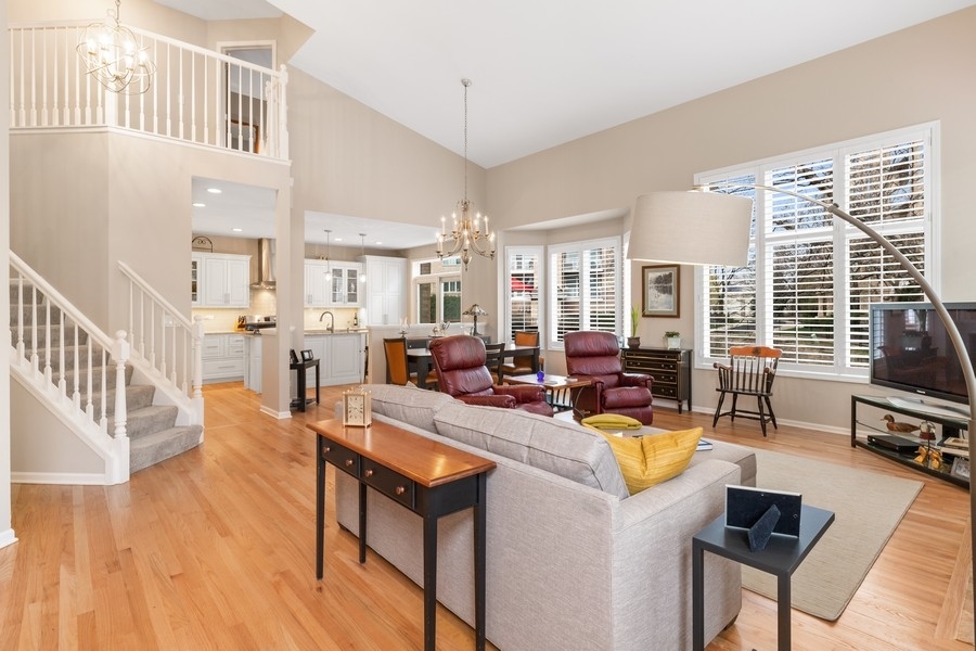 1722 Park Ridge Point Park Ridge, IL 60068 - Photo 2 of 25 a view of a dining room with furniture window and wooden floor
