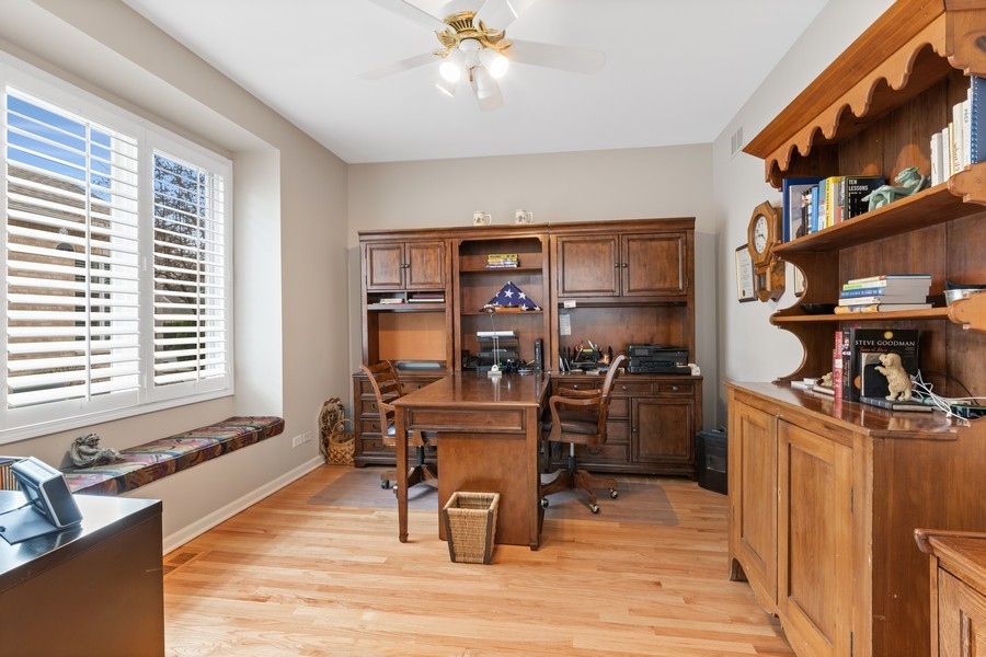 1722 Park Ridge Point Park Ridge, IL 60068 - Photo 8 of 25 a view of a workspace with furniture and a window