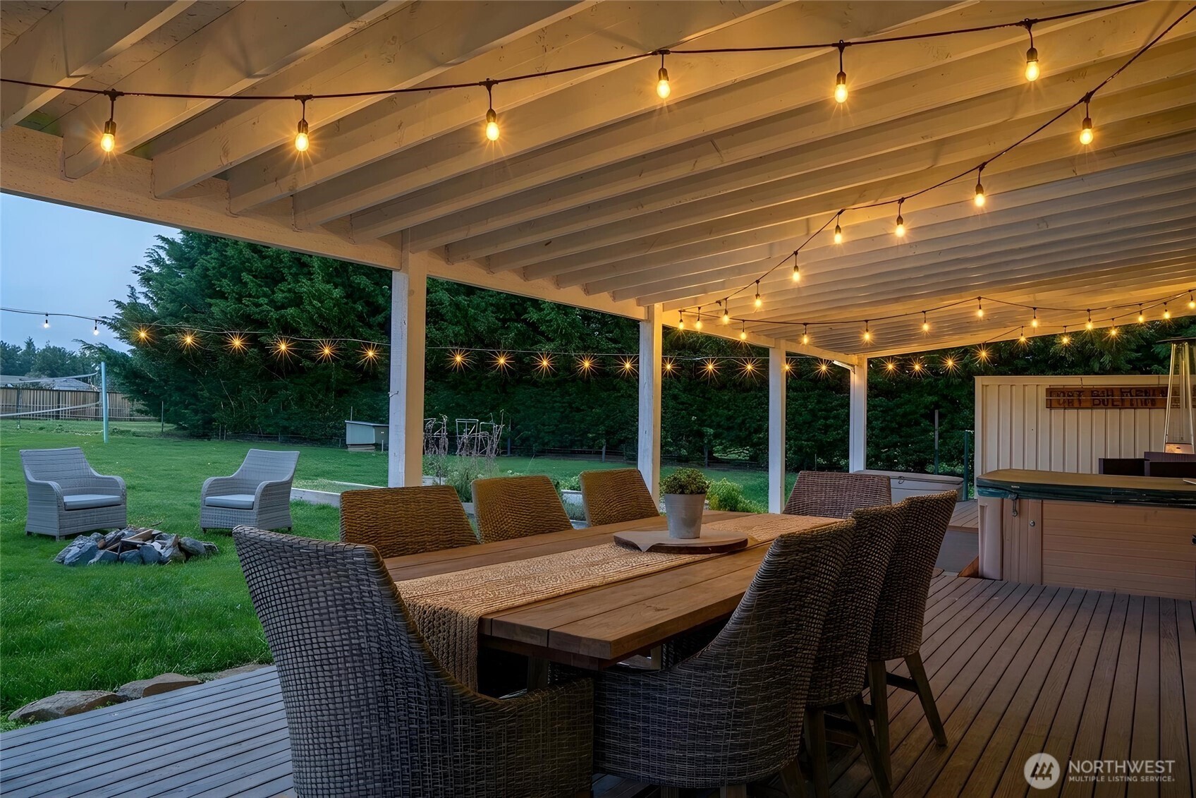 787 North Kendall Road Sequim, WA 98382 - Photo 16 of 40 a view of a patio with table and chairs and a barbeque
