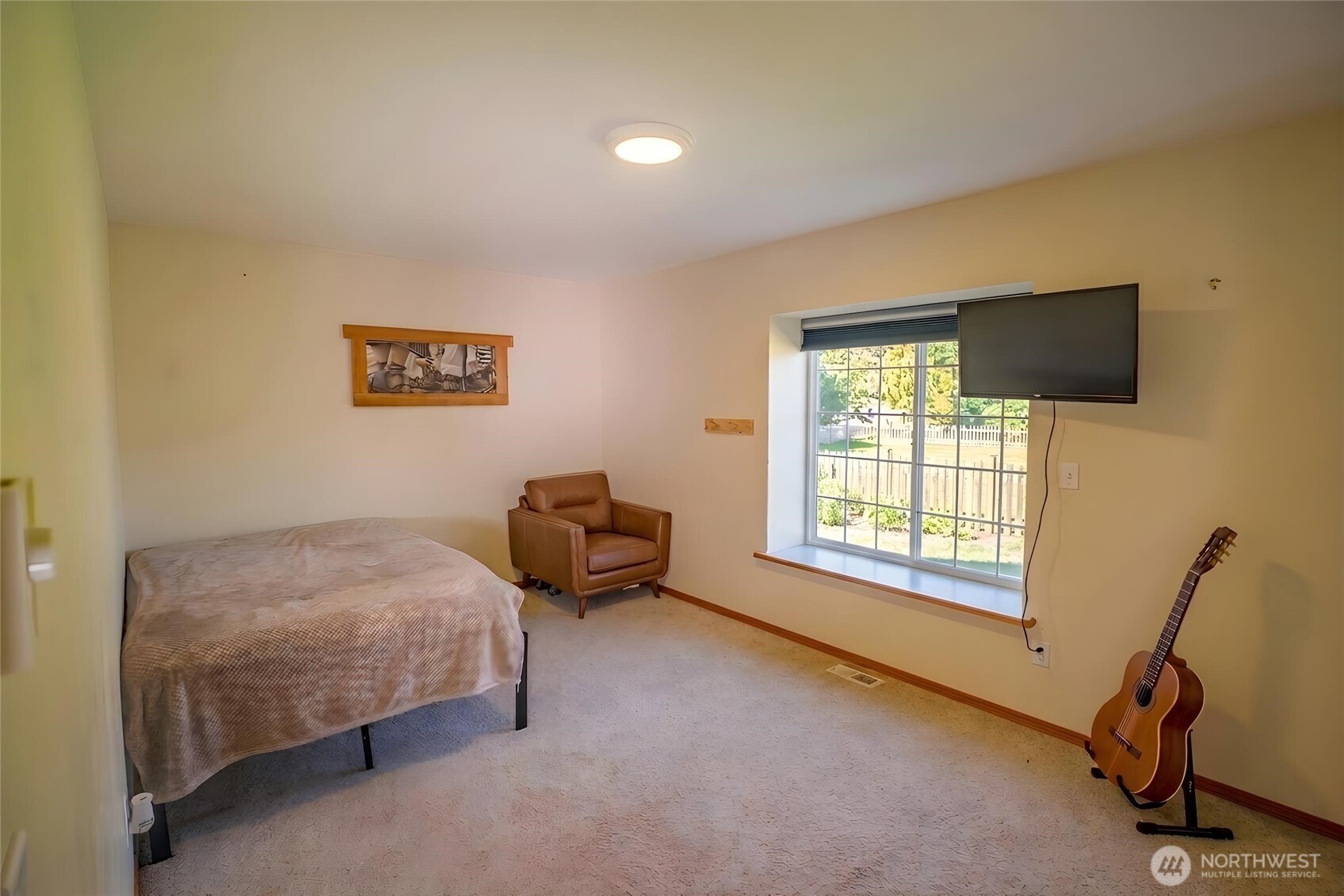 787 North Kendall Road Sequim, WA 98382 - Photo 22 of 40 a bedroom with bed and a window