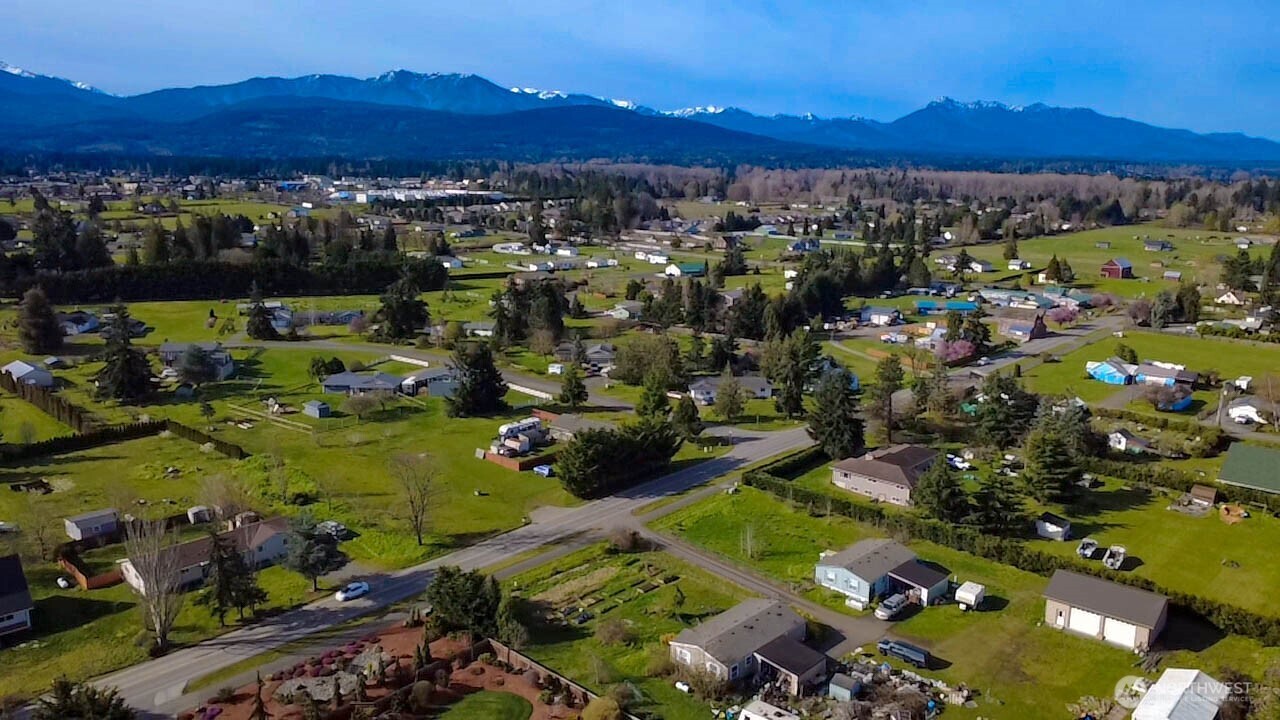 787 North Kendall Road Sequim, WA 98382 - Photo 34 of 40 a view of a city with mountains in the background