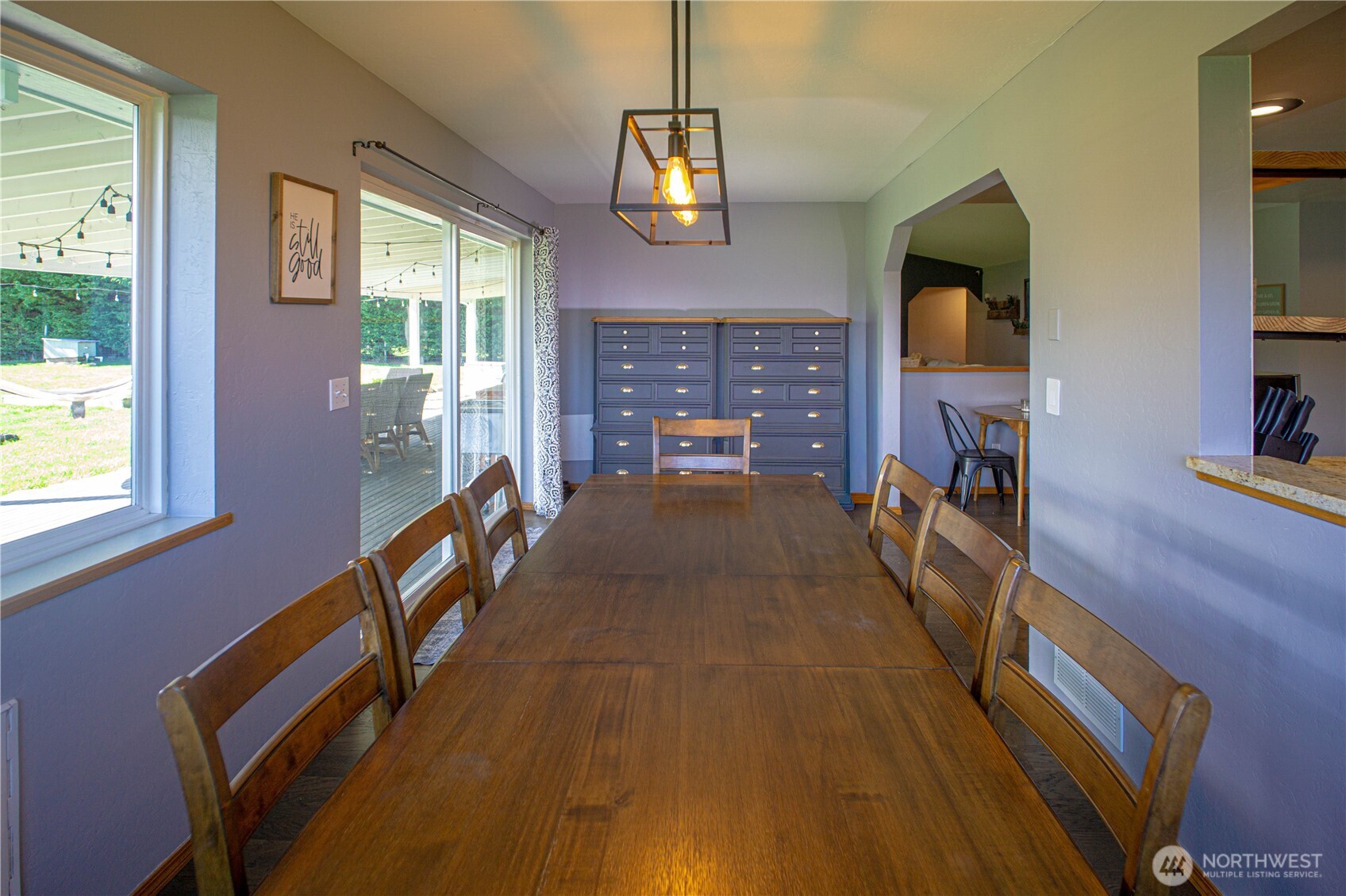 787 North Kendall Road Sequim, WA 98382 - Photo 10 of 40 a living room with furniture a window and a flat screen tv