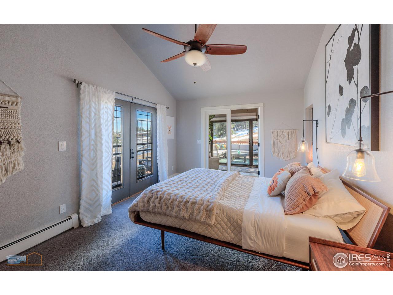 8323 West Fork Road Boulder, CO 80302 - Photo 20 of 36 a bedroom with a bed and window