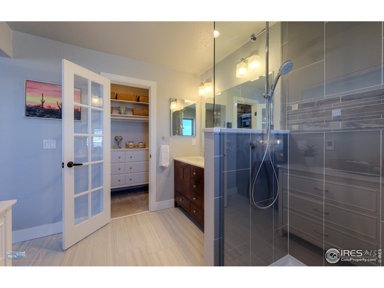 8323 West Fork Road Boulder, CO 80302 - Photo 22 of 36 a bathroom with a sink a toilet and shower