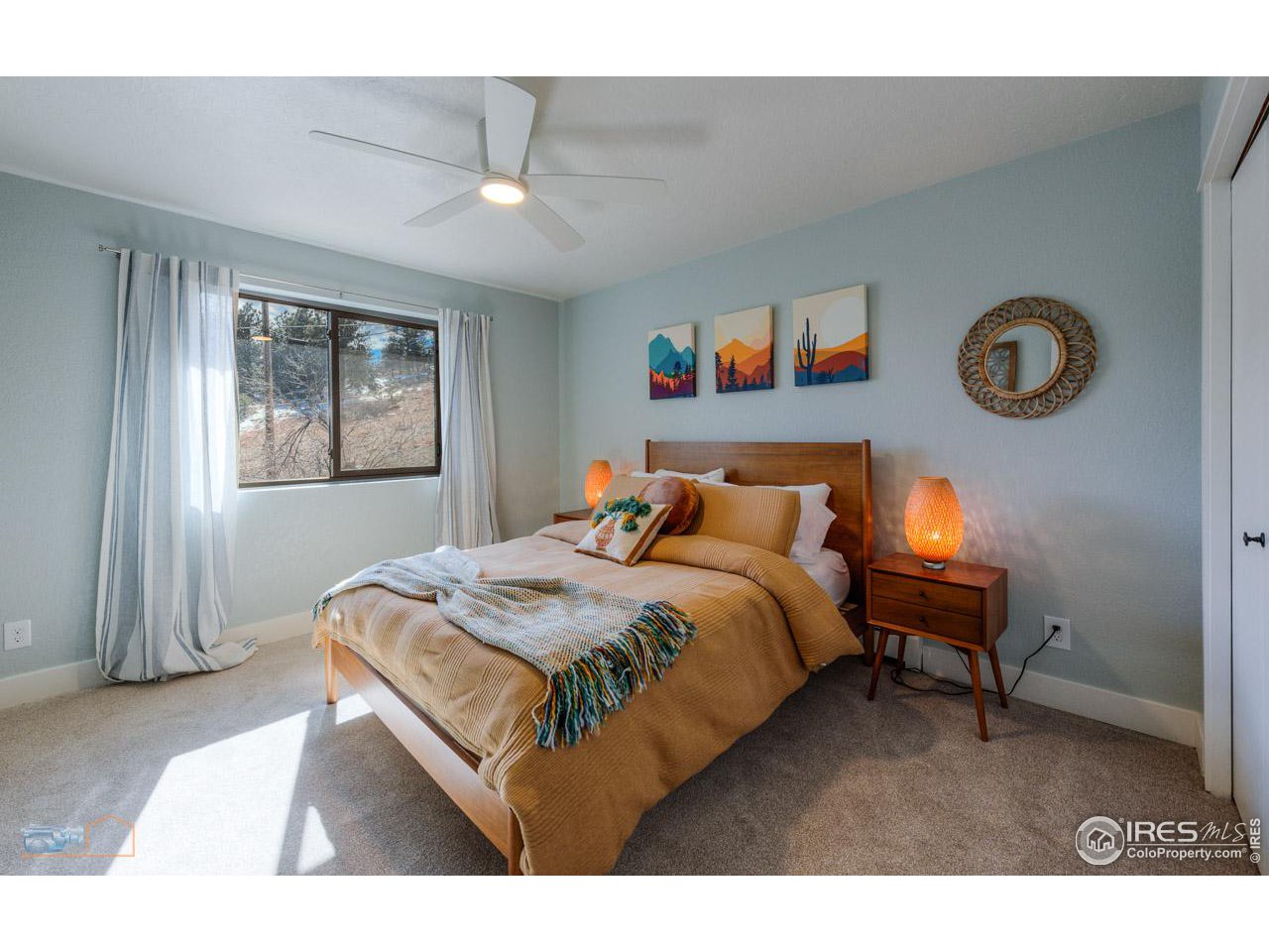 8323 West Fork Road Boulder, CO 80302 - Photo 26 of 36 a bedroom with a bed and a window