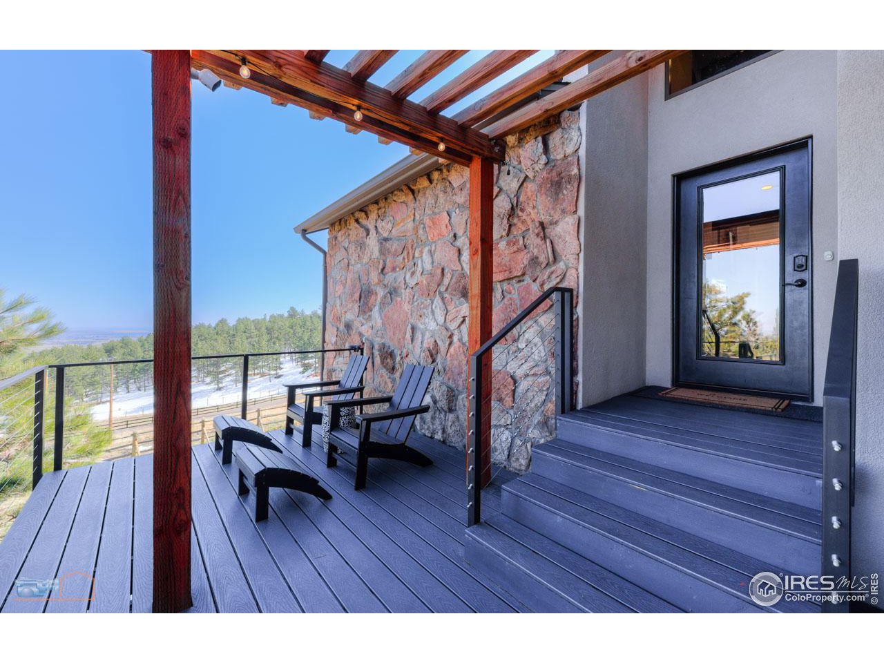 8323 West Fork Road Boulder, CO 80302 - Photo 4 of 36 a view of entryway dining room and hall with wooden floor