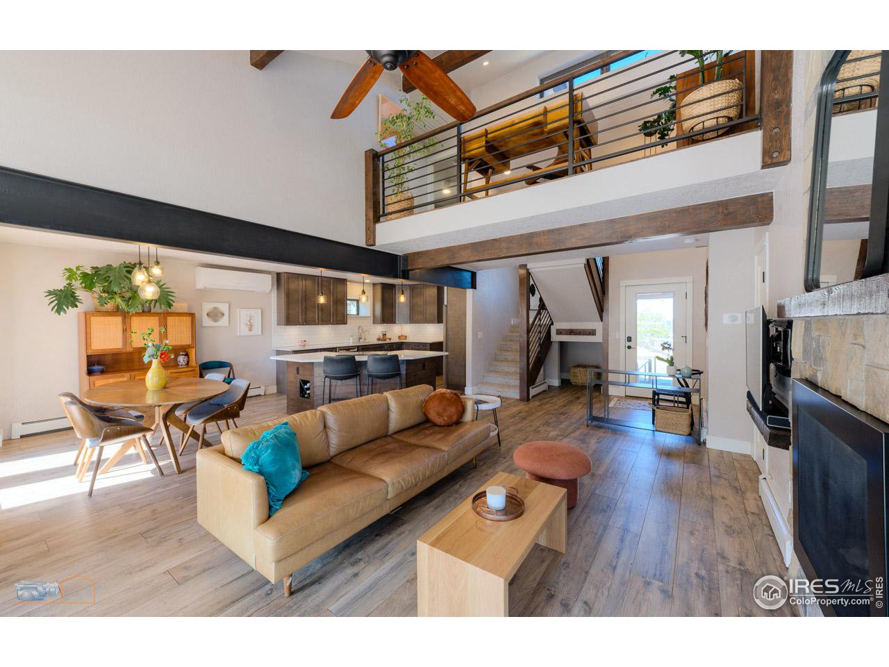8323 West Fork Road Boulder, CO 80302 - Photo 7 of 36 a living room with furniture and a wooden floor