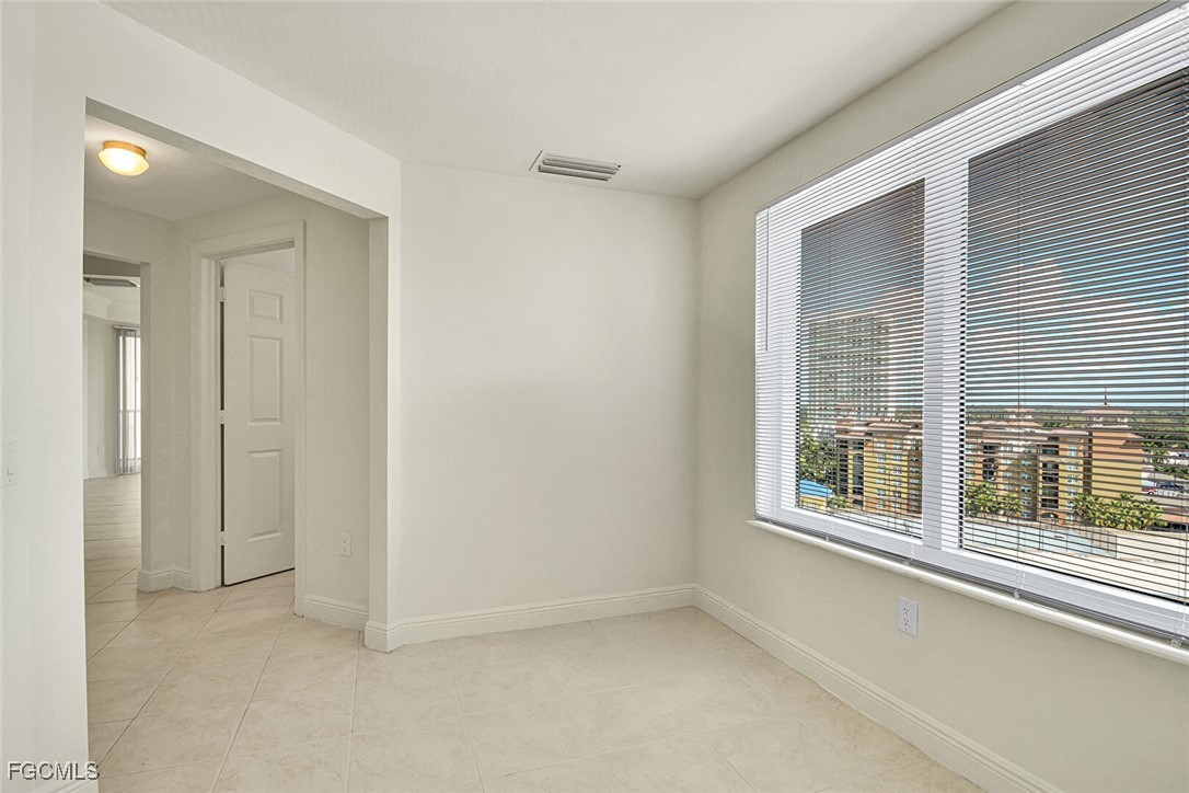 2743 First Street, Unit 1006 Fort Myers, FL 33916 - Photo 15 of 38 an empty room with a window