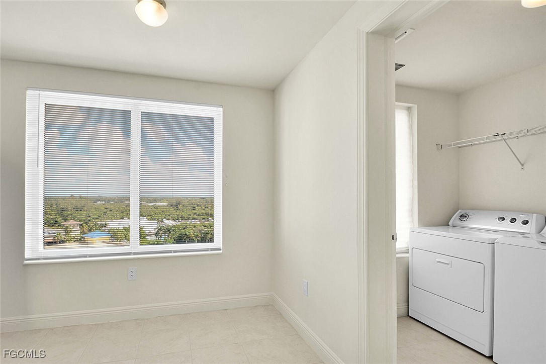 2743 First Street, Unit 1006 Fort Myers, FL 33916 - Photo 16 of 38 a utility room with dryer and washer