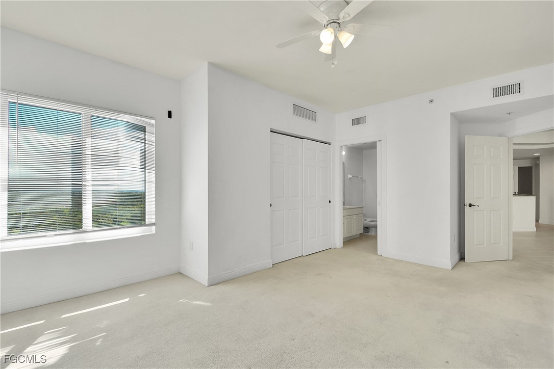 2743 First Street, Unit 1006 Fort Myers, FL 33916 - Photo 21 of 38 a view of an empty room with a window