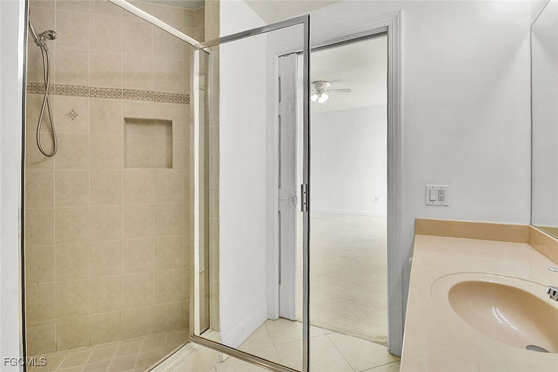 2743 First Street, Unit 1006 Fort Myers, FL 33916 - Photo 22 of 38 a bathroom with a shower and a sink