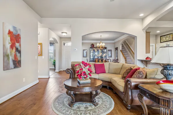 a living room with furniture and a table