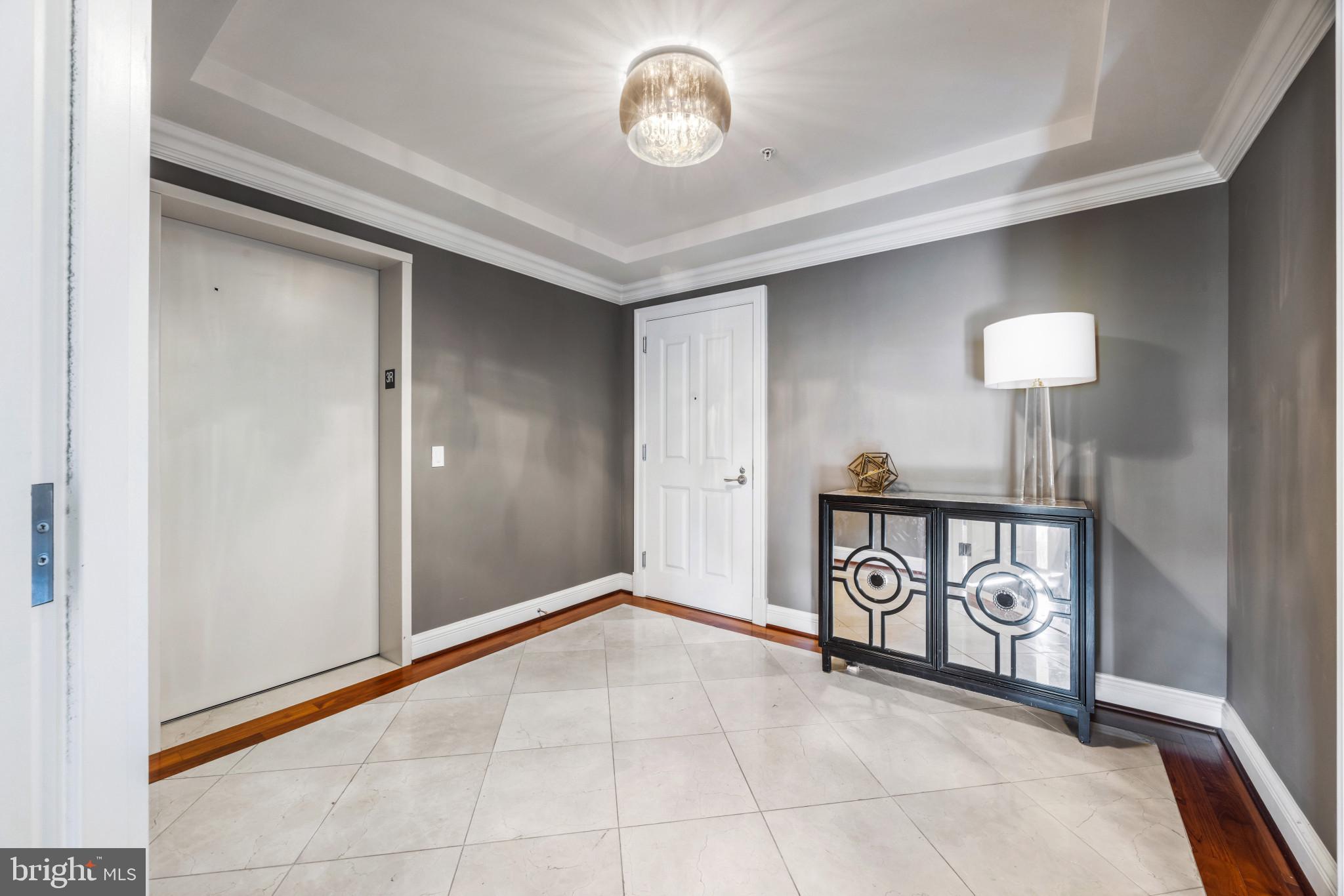 801 Key Highway, Unit 323 Baltimore, MD 21230 - Photo 2 of 56 a view of an entryway with wooden floor