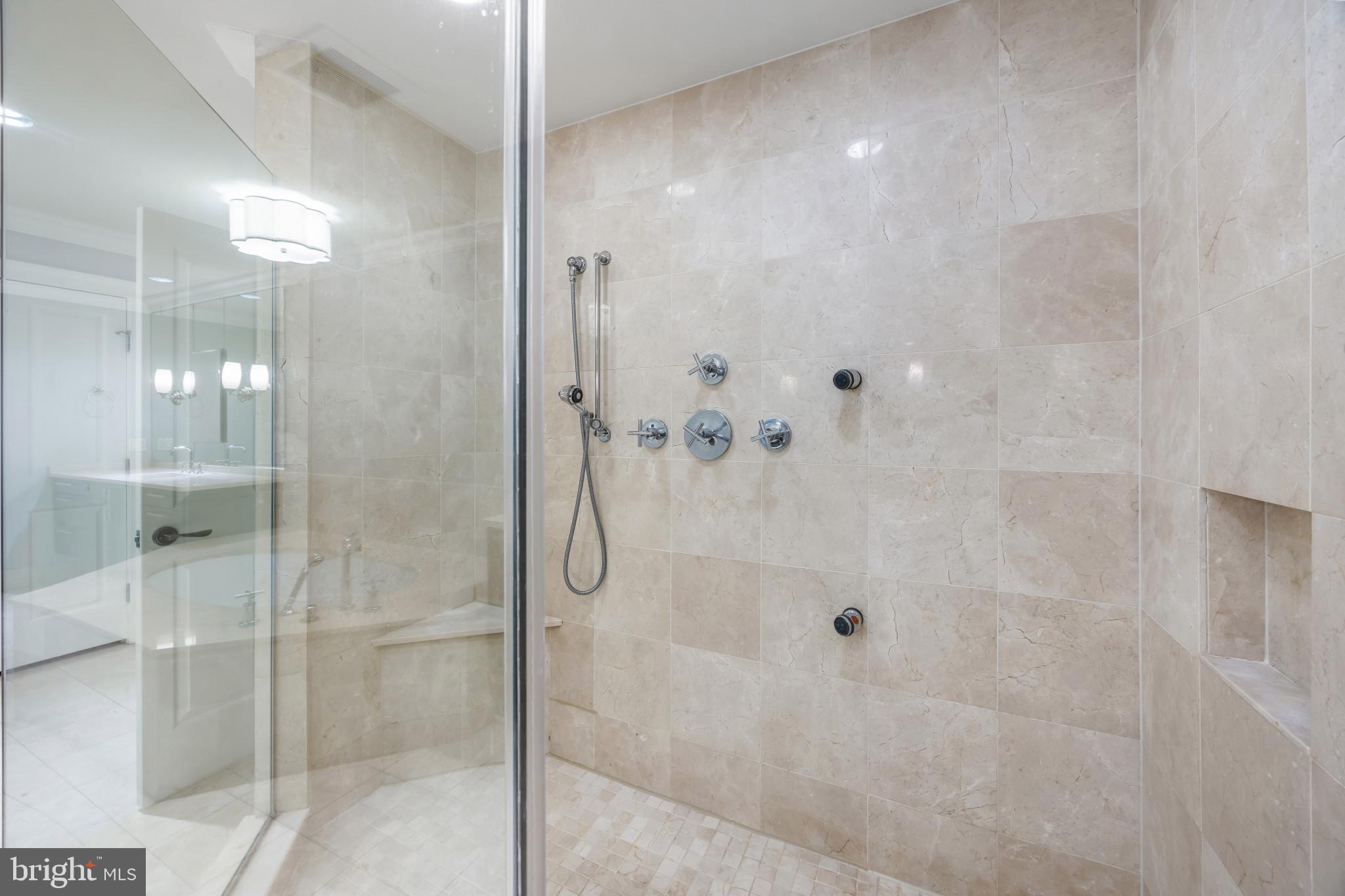 801 Key Highway, Unit 323 Baltimore, MD 21230 - Photo 33 of 56 a bathroom with a glass shower door