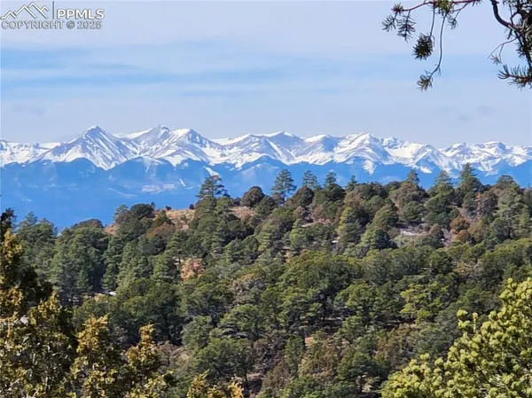 a view of a sky with mountains in the background