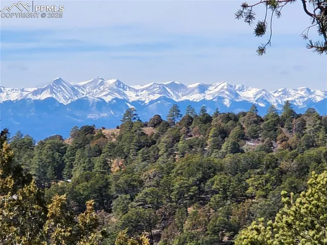 a view of a sky with mountains in the background