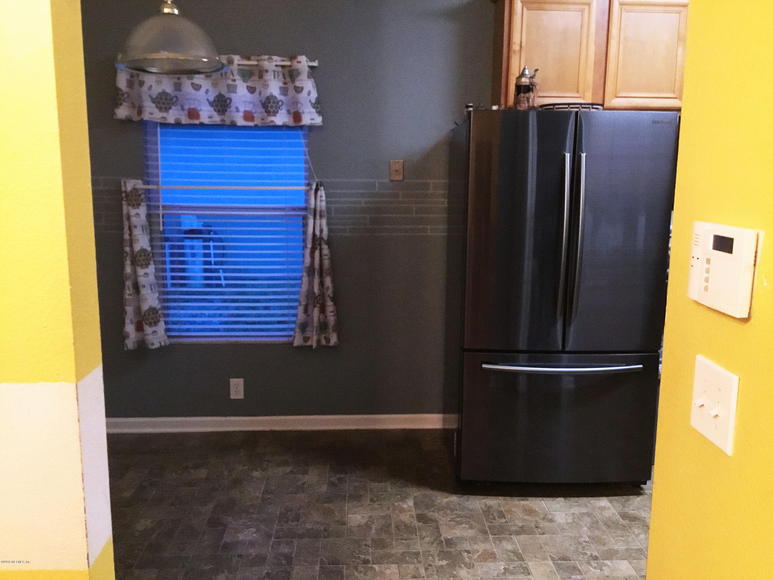 1920 River Rock Road Jacksonville, FL 32221 - Photo 6 of 19 Entry to Kitchen