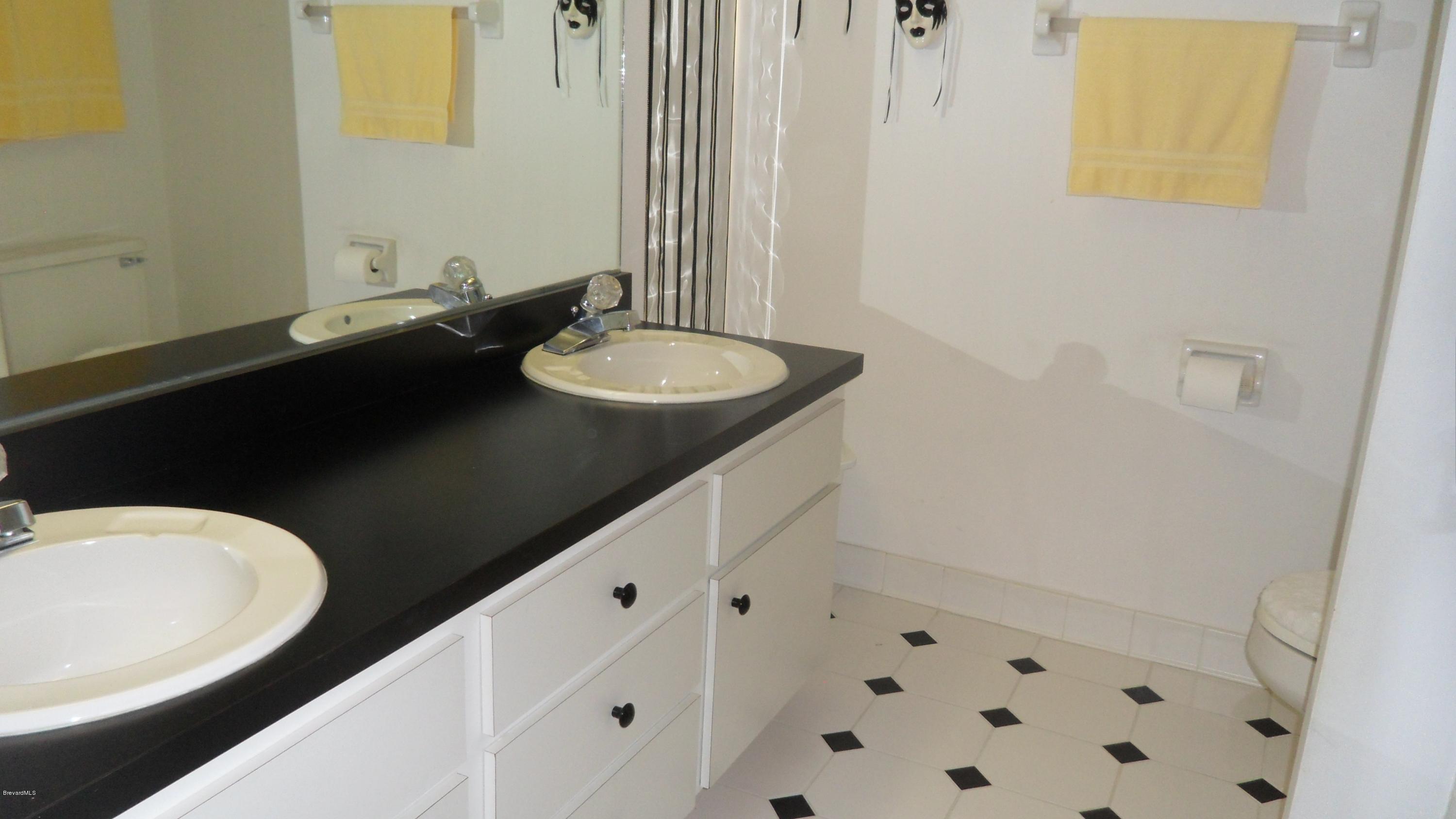 407 Myrtlewood Road Melbourne, FL 32940 - Photo 4 of 31 Master Bath with Double sinks and Shower