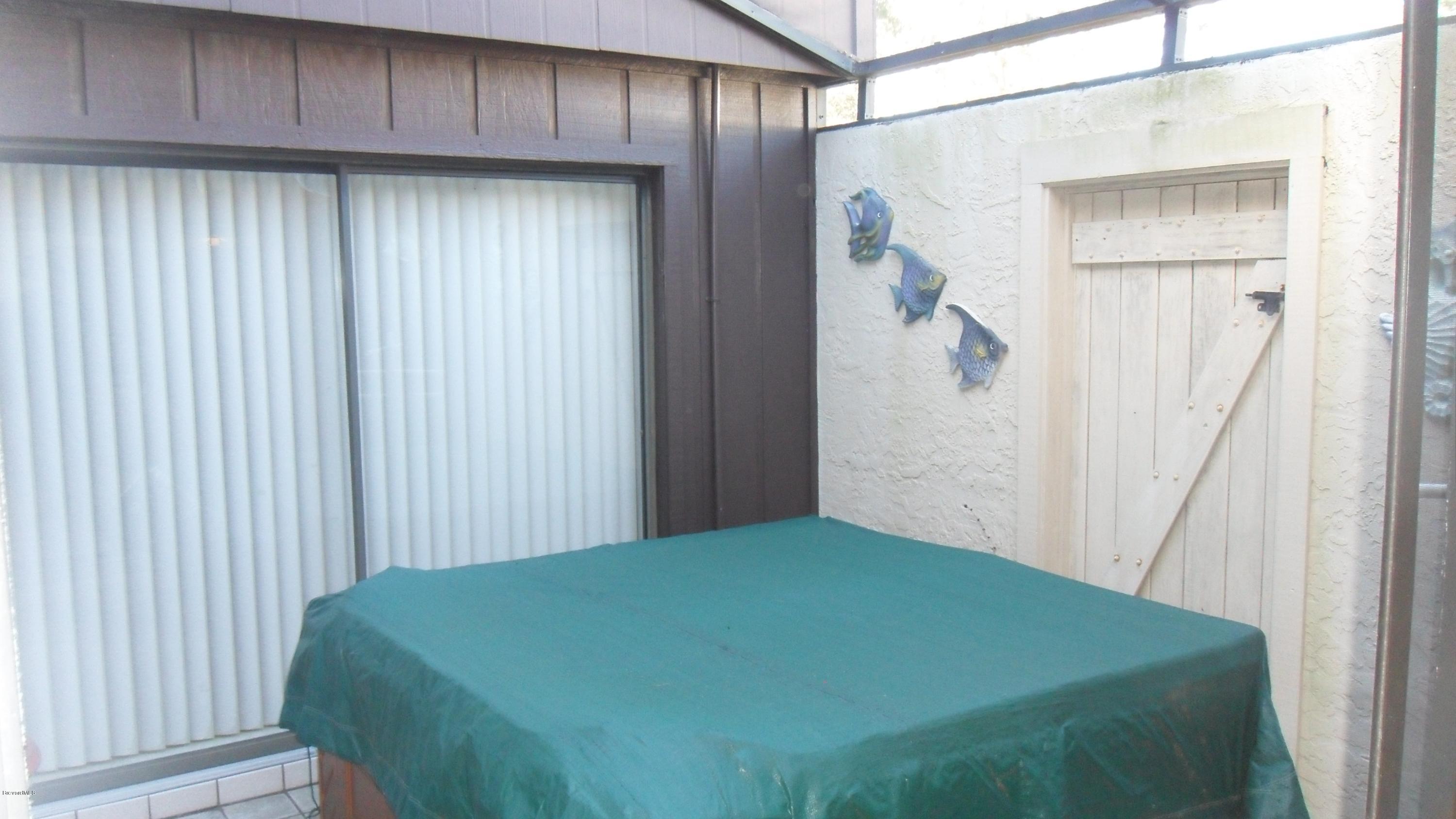 407 Myrtlewood Road Melbourne, FL 32940 - Photo 7 of 31 Atrium with Hot Tub