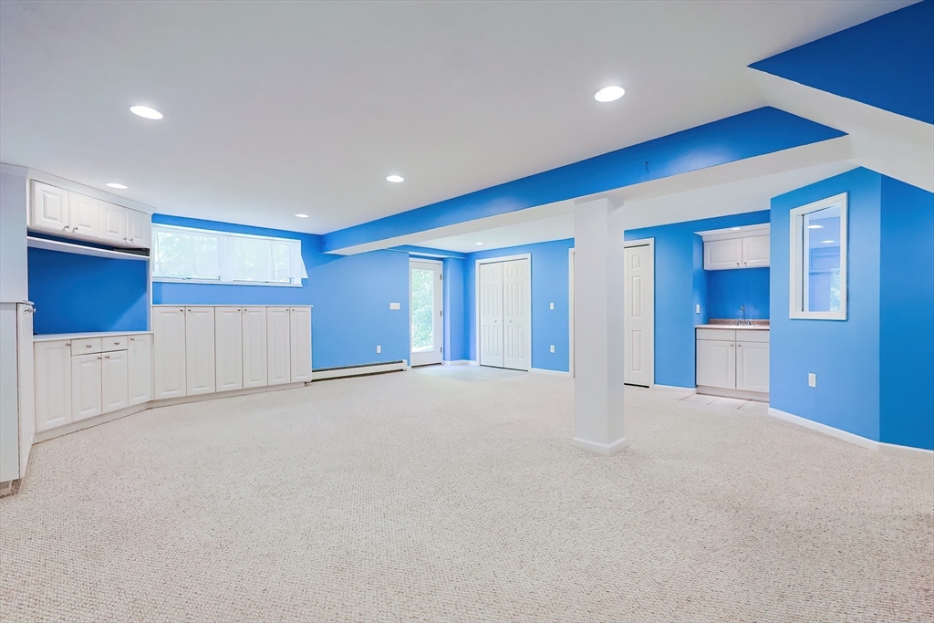 10 Prospect Street Upton, MA 01568 - Photo 16 of 41 a view of an empty room with a kitchen