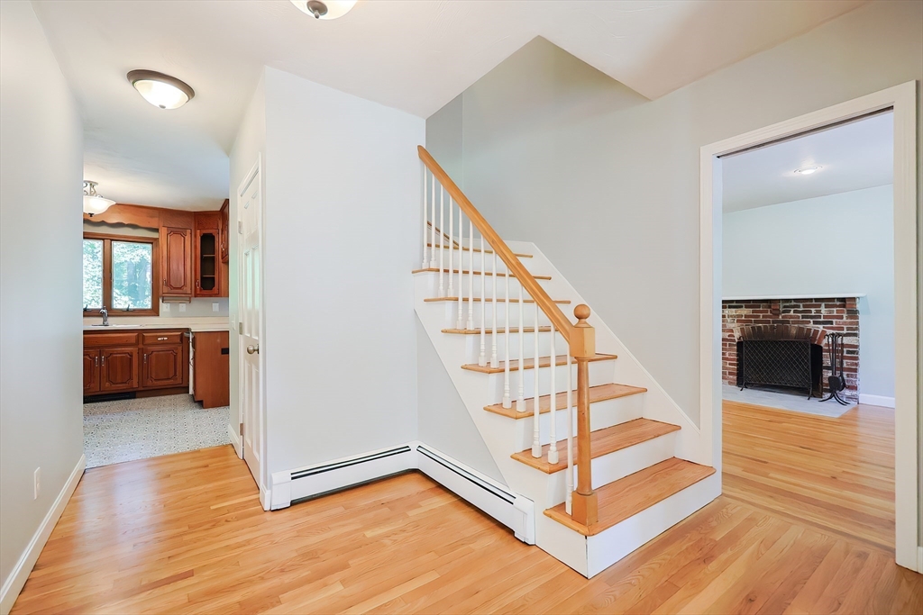 10 Prospect Street Upton, MA 01568 - Photo 17 of 41 a view of a kitchen with wooden floor and electronic appliances