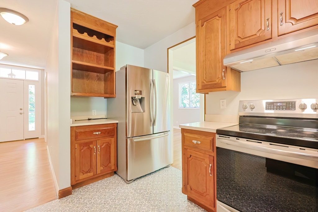 10 Prospect Street Upton, MA 01568 - Photo 3 of 41 a kitchen with stainless steel appliances granite countertop a refrigerator and a stove