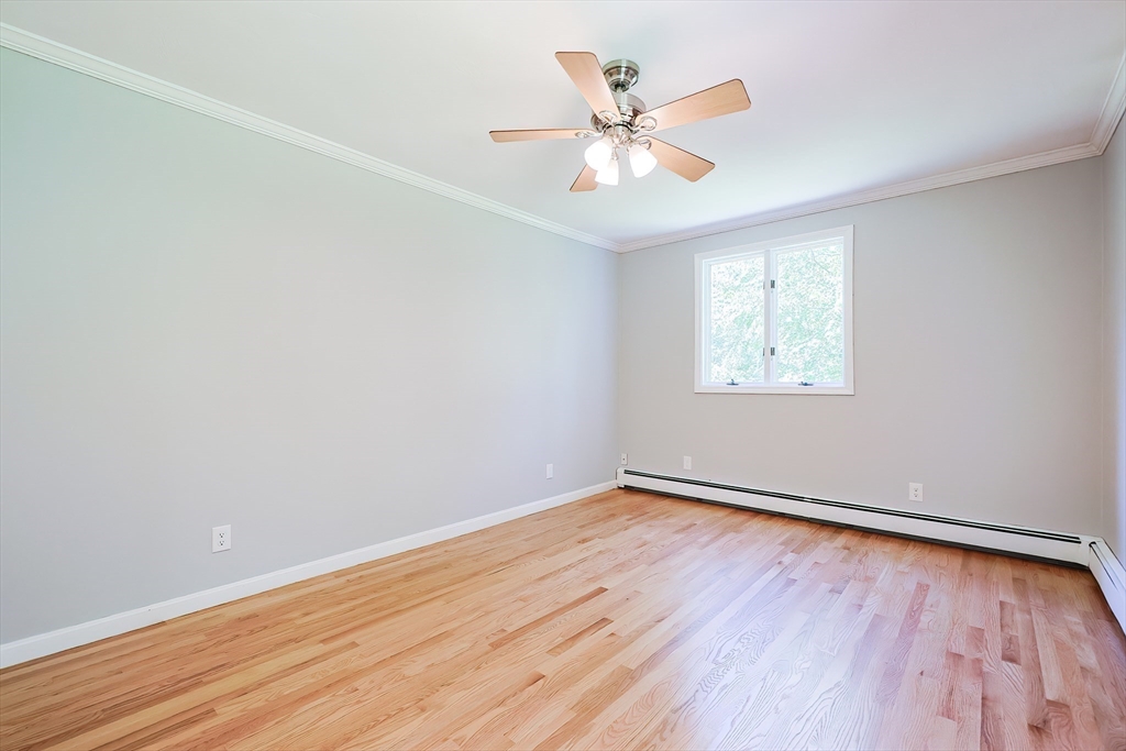 10 Prospect Street Upton, MA 01568 - Photo 31 of 41 wooden floor in an empty room with a window