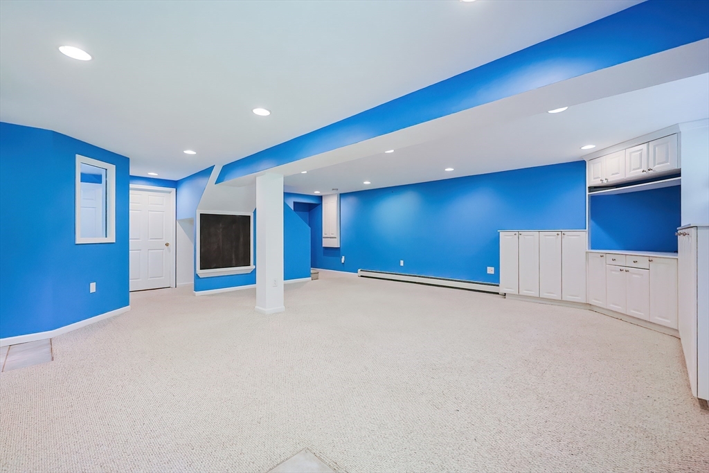10 Prospect Street Upton, MA 01568 - Photo 32 of 41 a view of an empty room with a kitchen