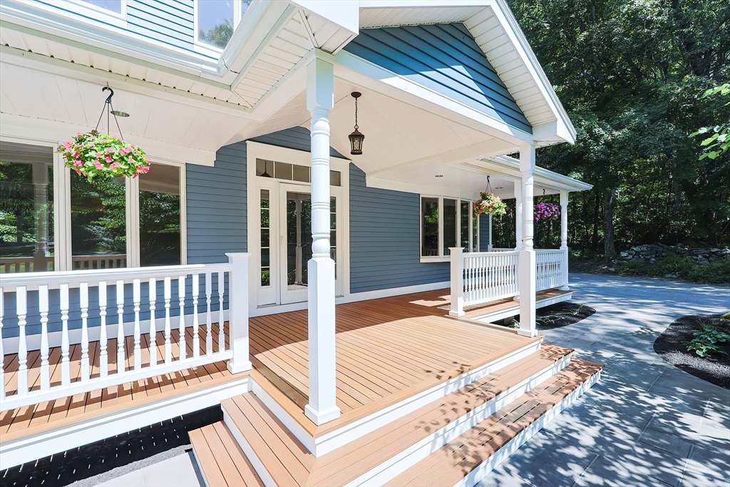 10 Prospect Street Upton, MA 01568 - Photo 41 of 41 a view of a house with a porch and furniture