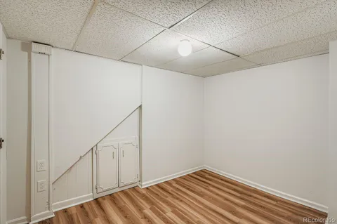 a view of a room with white walls