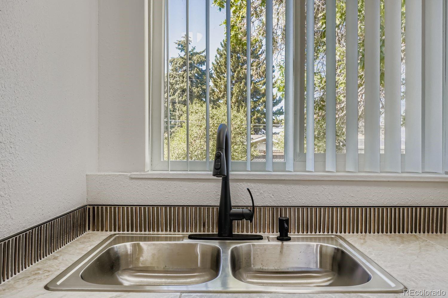 3670 Magnolia Street Denver, CO 80207 - Photo 6 of 26 a view of utility room and utility room