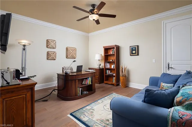 a bathroom with a sink a toilet and a shower curtain