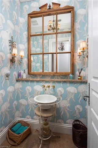 a room with a bed and furniture