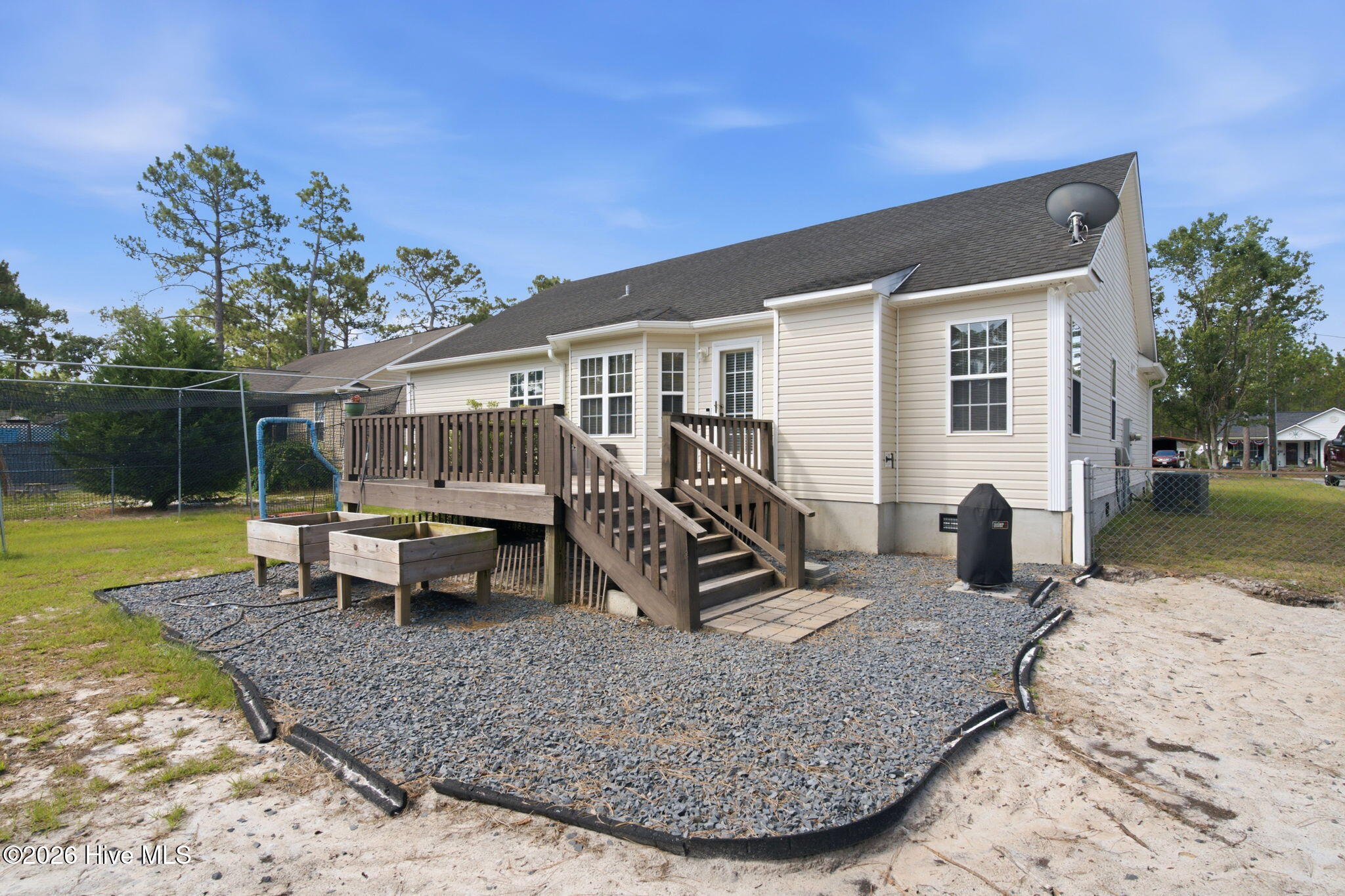 324 Ash Road Southport, NC 28461 - Photo 28 of 34 View of the backyard from the side
