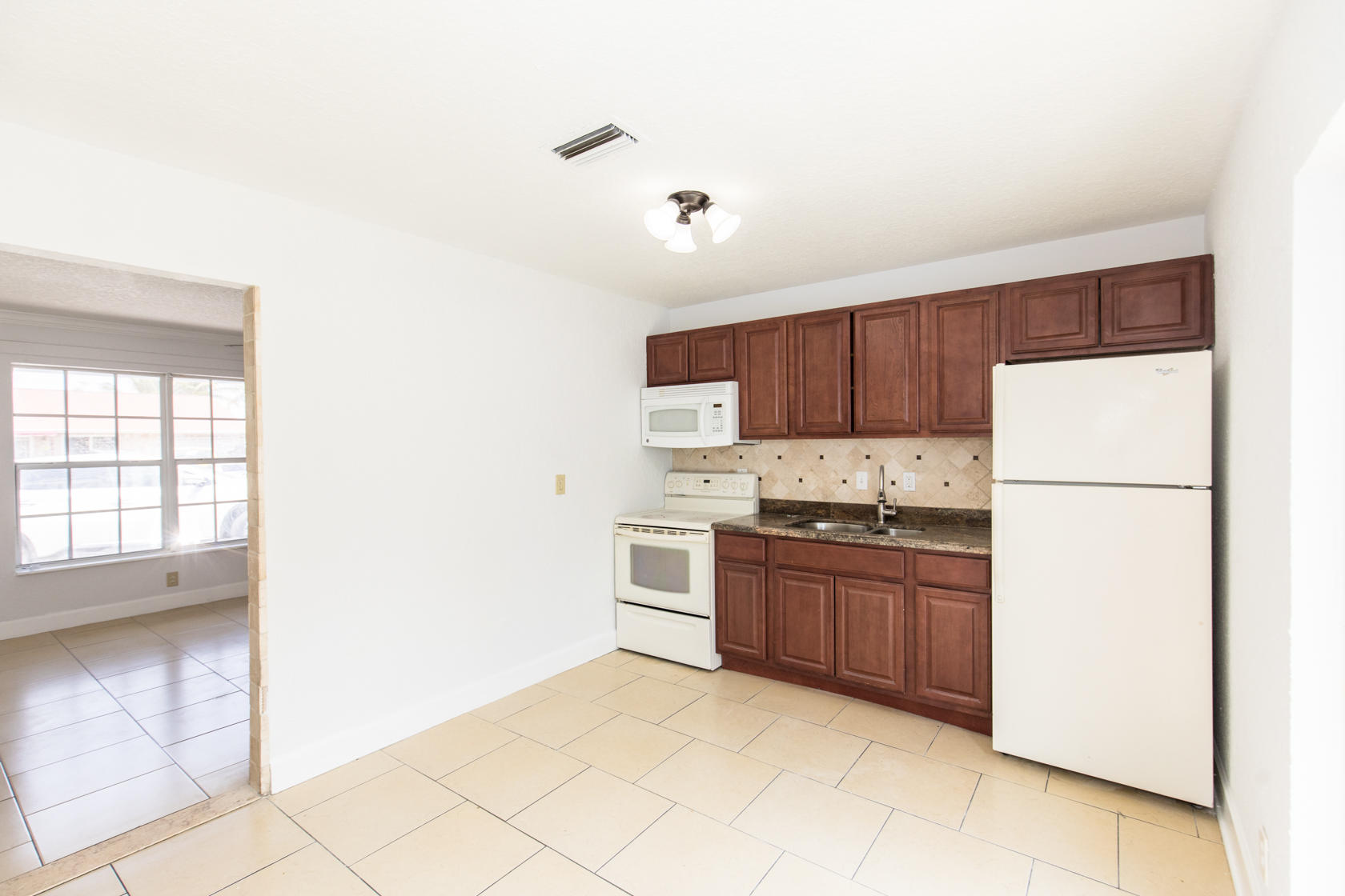 2602 West 28th Street Riviera Beach, FL 33404 - Photo 16 of 23 2602 W 28th St-511