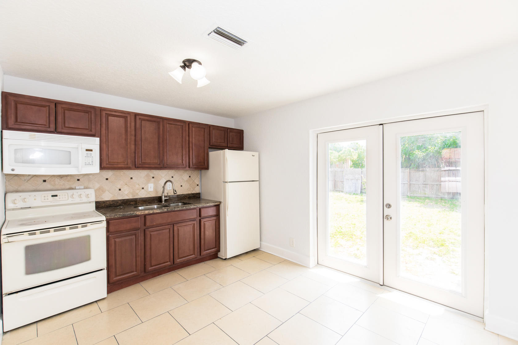 2602 West 28th Street Riviera Beach, FL 33404 - Photo 2 of 23 2602 W 28th St-513