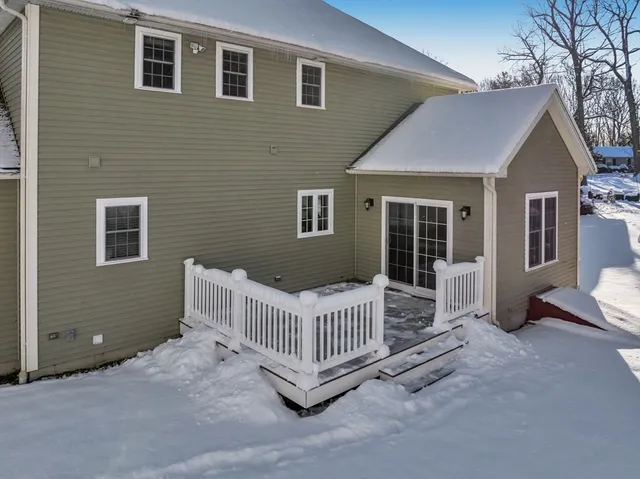 a view of a house with a deck
