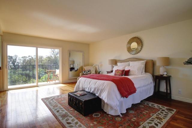 751 Skyview Drive Santa Barbara, CA 93108 - Photo 15 of 31 a bed sitting in a bedroom next to a window