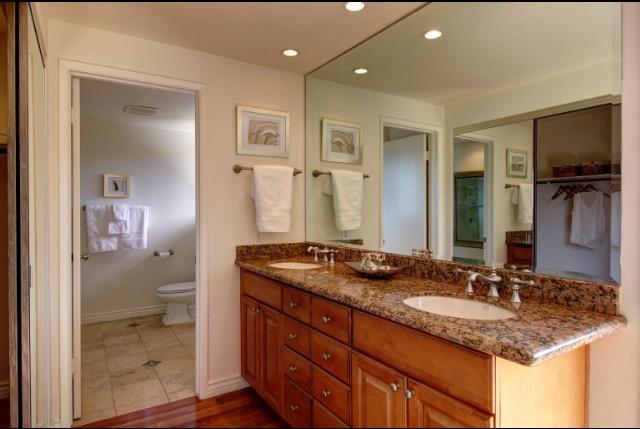 751 Skyview Drive Santa Barbara, CA 93108 - Photo 17 of 31 a bathroom with a granite countertop sink and a mirror