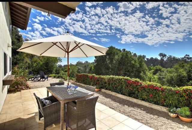 751 Skyview Drive Santa Barbara, CA 93108 - Photo 30 of 31 a view of a patio with furniture and a yard