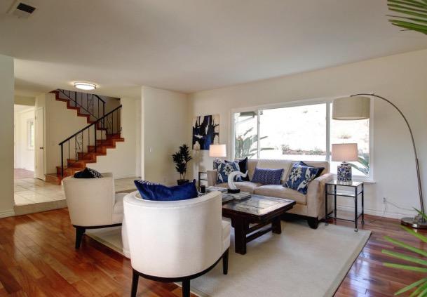 751 Skyview Drive Santa Barbara, CA 93108 - Photo 5 of 31 a living room with furniture a table and a potted plant
