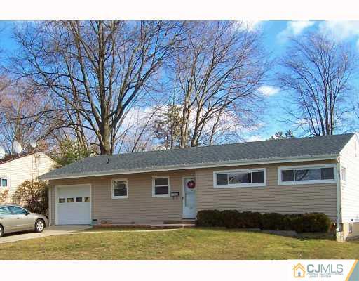 55 Princeton Road Old Bridge, NJ 08859 - Photo 1 of 7 a front view of a house with a yard