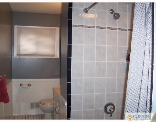 55 Princeton Road Old Bridge, NJ 08859 - Photo 5 of 7 a bathroom with a toilet and a shower