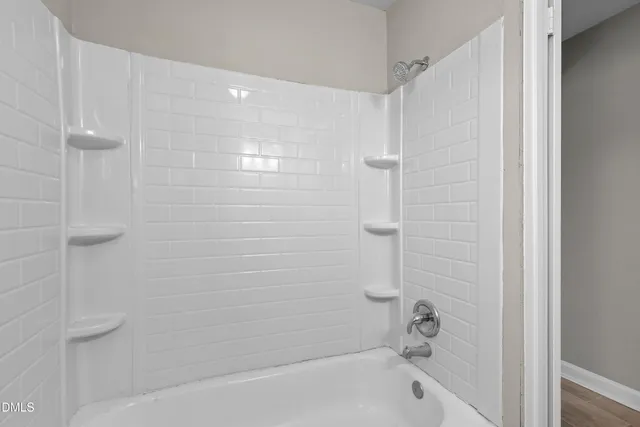 a bathroom with a bathtub