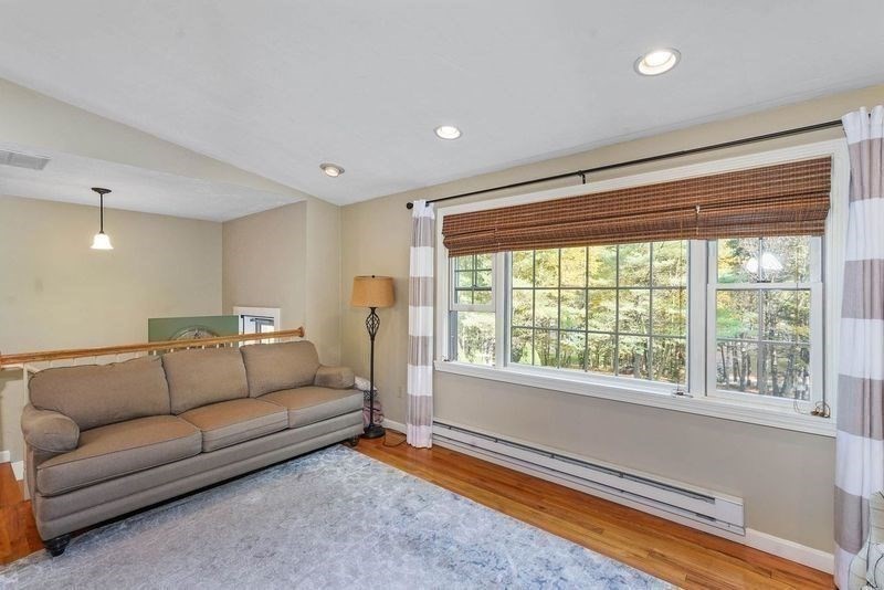 40 Breakneck Road Sturbridge, MA 01566 - Photo 14 of 39 a living room with furniture and a large window