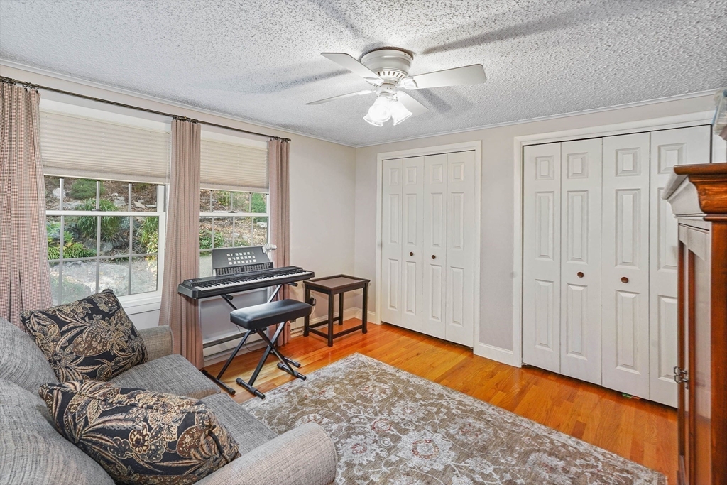 40 Breakneck Road Sturbridge, MA 01566 - Photo 18 of 39 a living room with furniture and a window